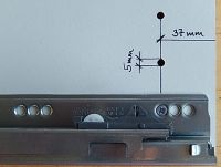 Fixing the drawer runners with system screw: 37mm from the front edge of the cabinet, 5mm hole